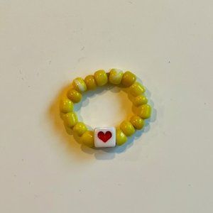 RED HEART BEADED RING, ONE SIZE, YELLOW BEADS